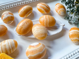 Orange Calcite Puffy Palm Stone