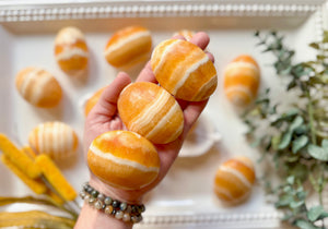 Orange Calcite Puffy Palm Stone