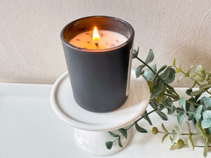 Three Feathers Apothecary Intentions Candle Collection Burning